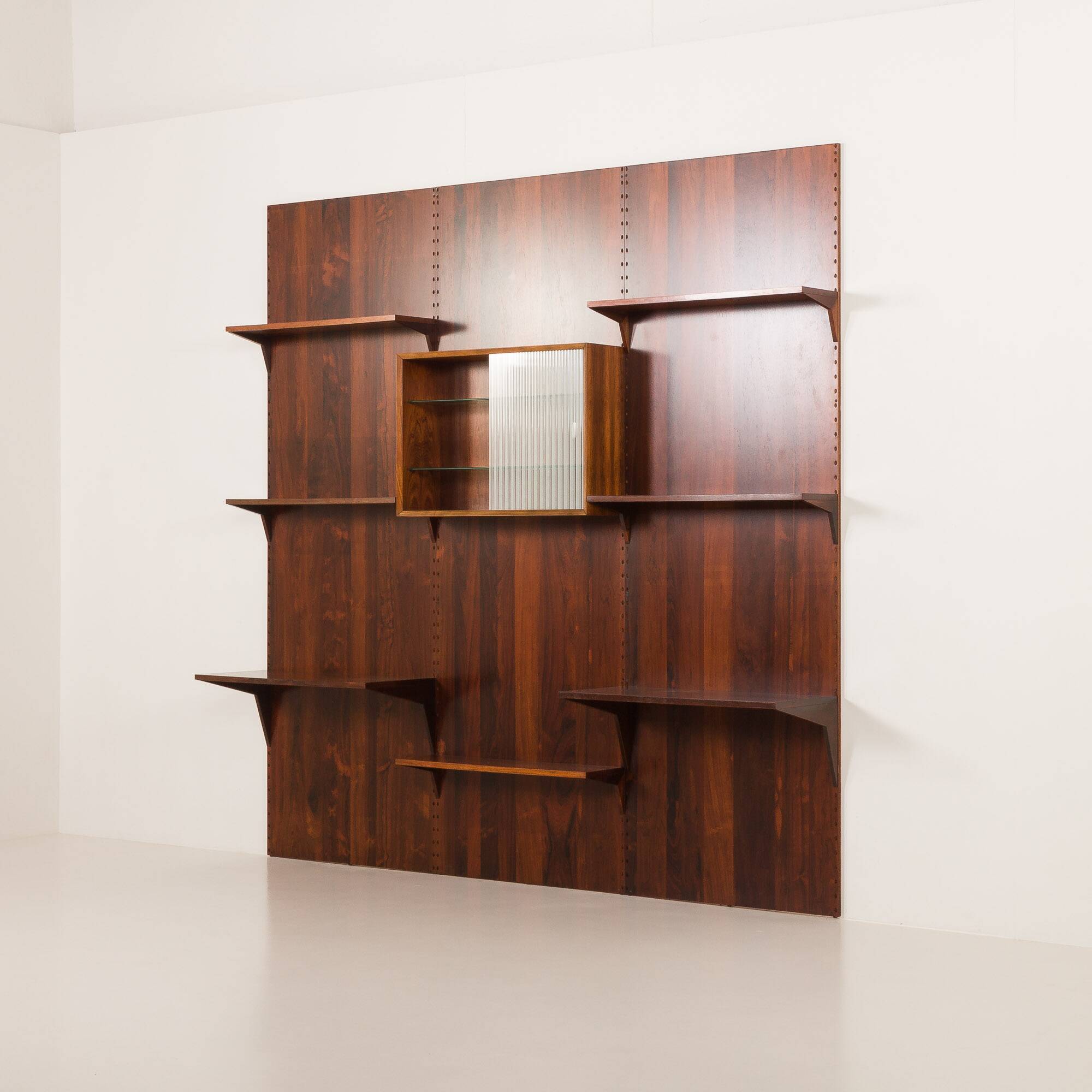 Poul Cadovius rosewood wall unit on panels for Cado, Denmark 1960s