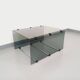 Table basse vintage en verre fumé, métal noir et fonte d’aluminium