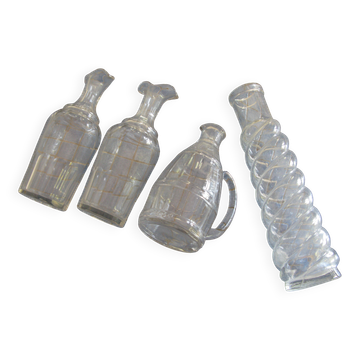 Set of 4 white glass carafes