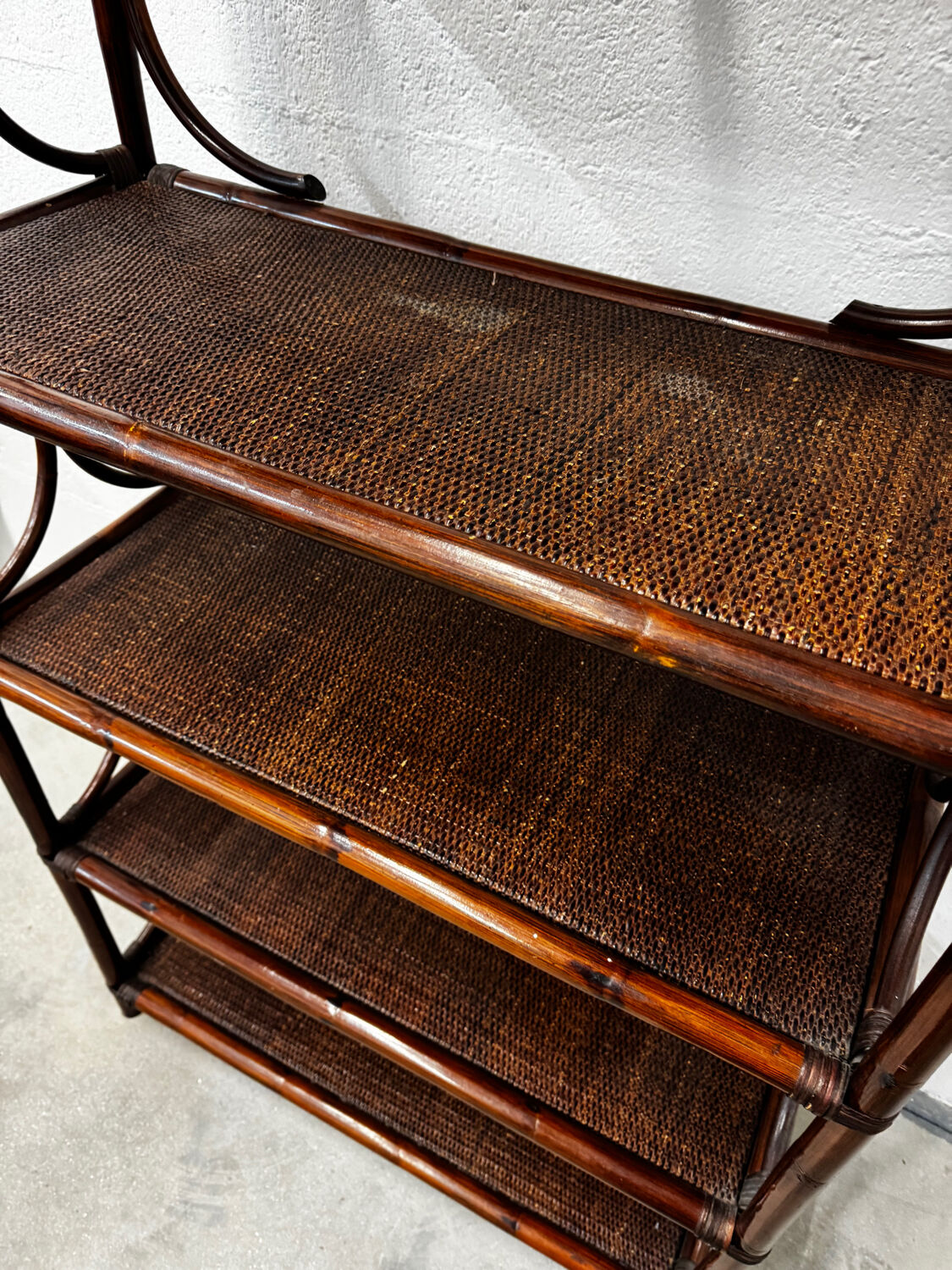 Dark rattan and bamboo bookshelf shelf