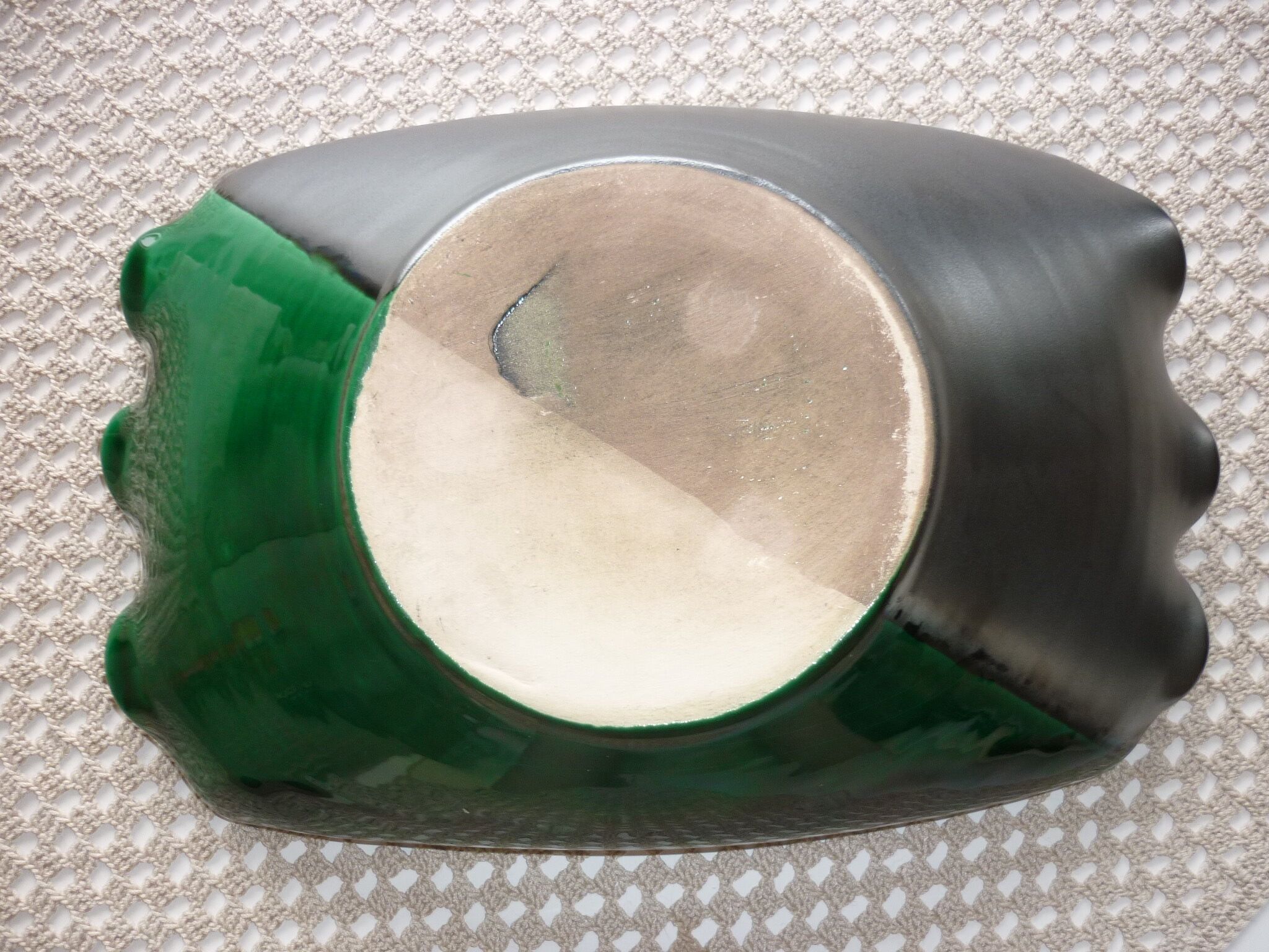 Green and black ceramic cup moist from the 1960s
