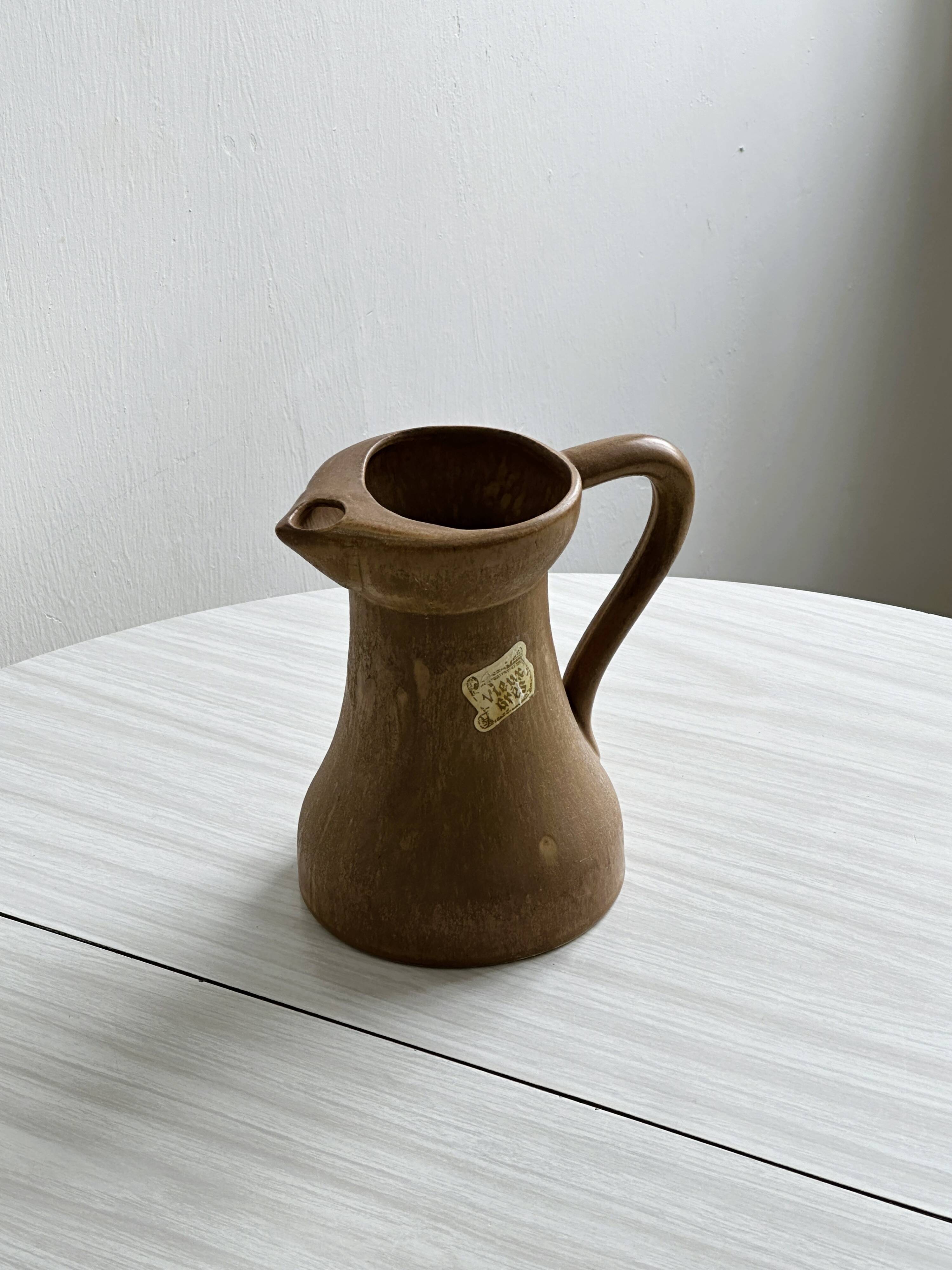 Stoneware pitcher - utensil pot.