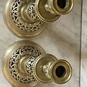 pair of openwork gilded brass candlesticks from the 19th century