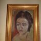 Portrait of young woman table XX century