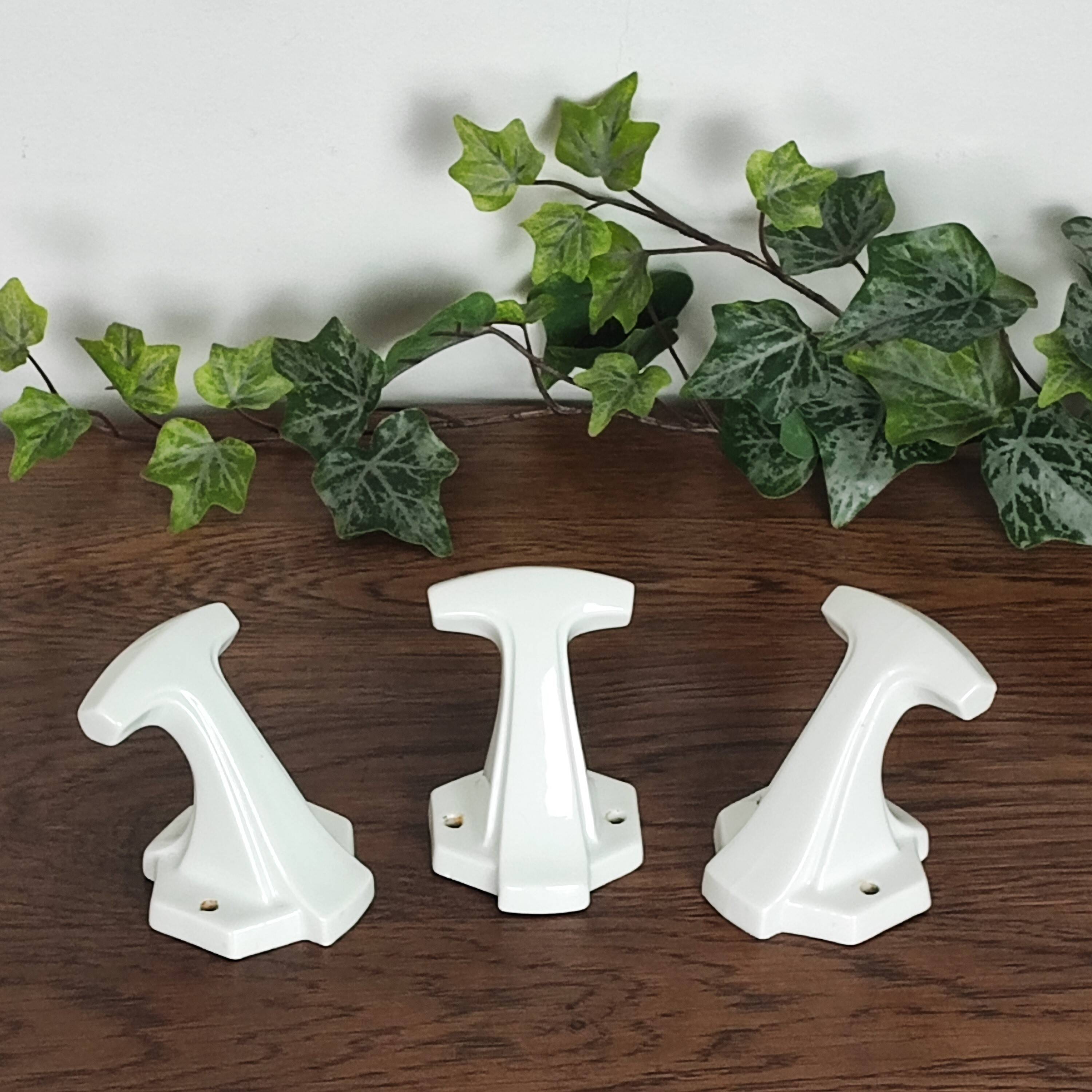 3 porcelain coat hooks
