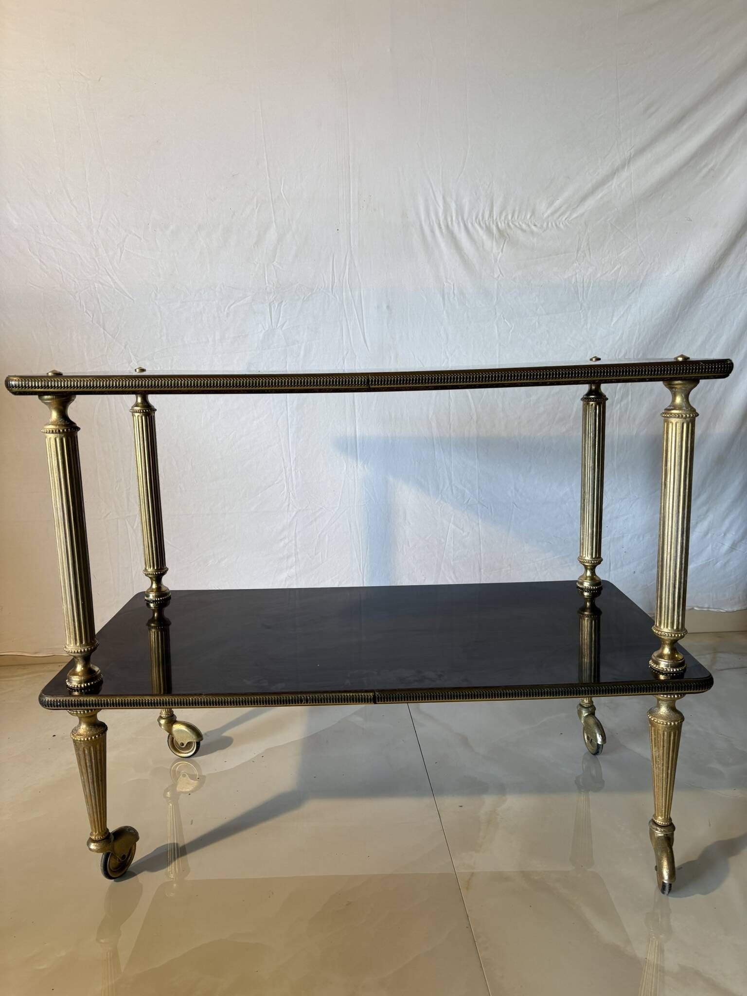 Vintage trolley on wheels, black wood and brass uprights