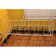 Vintage children's bed with white patina