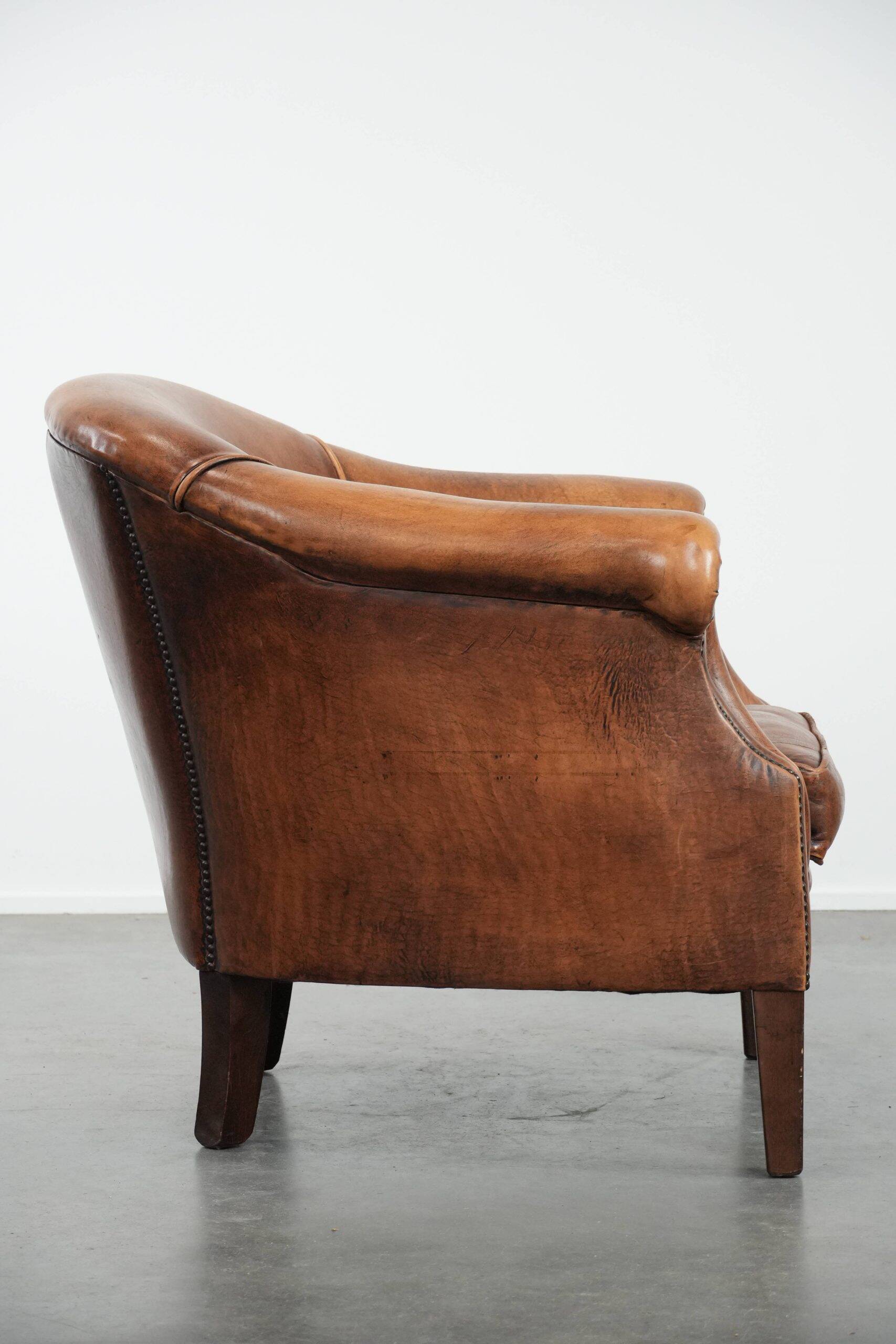 Sheepskin leather club chair with beautiful colours and comfortable seat