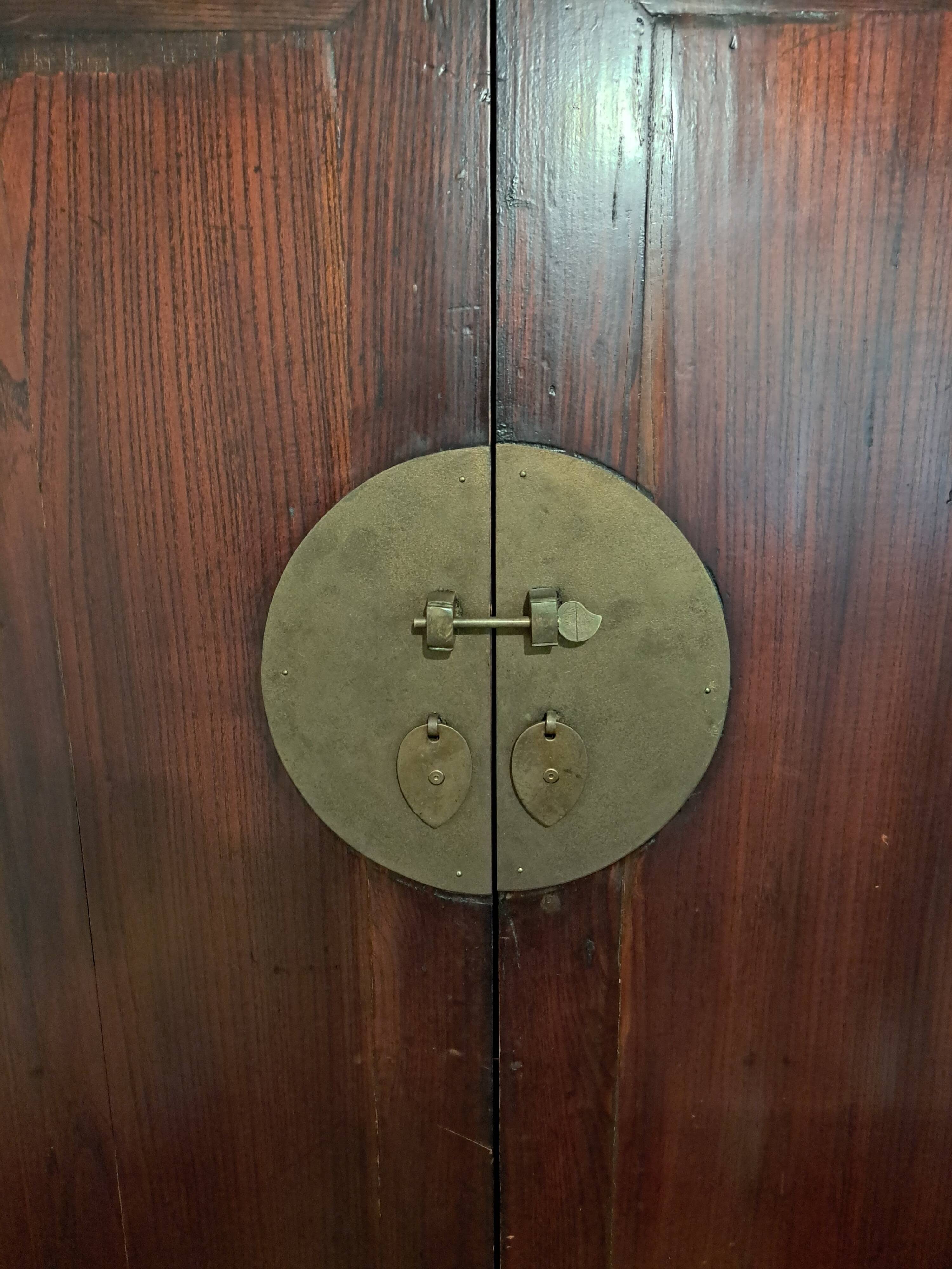 Brown lacquered Chinese wardrobe from Shandong.