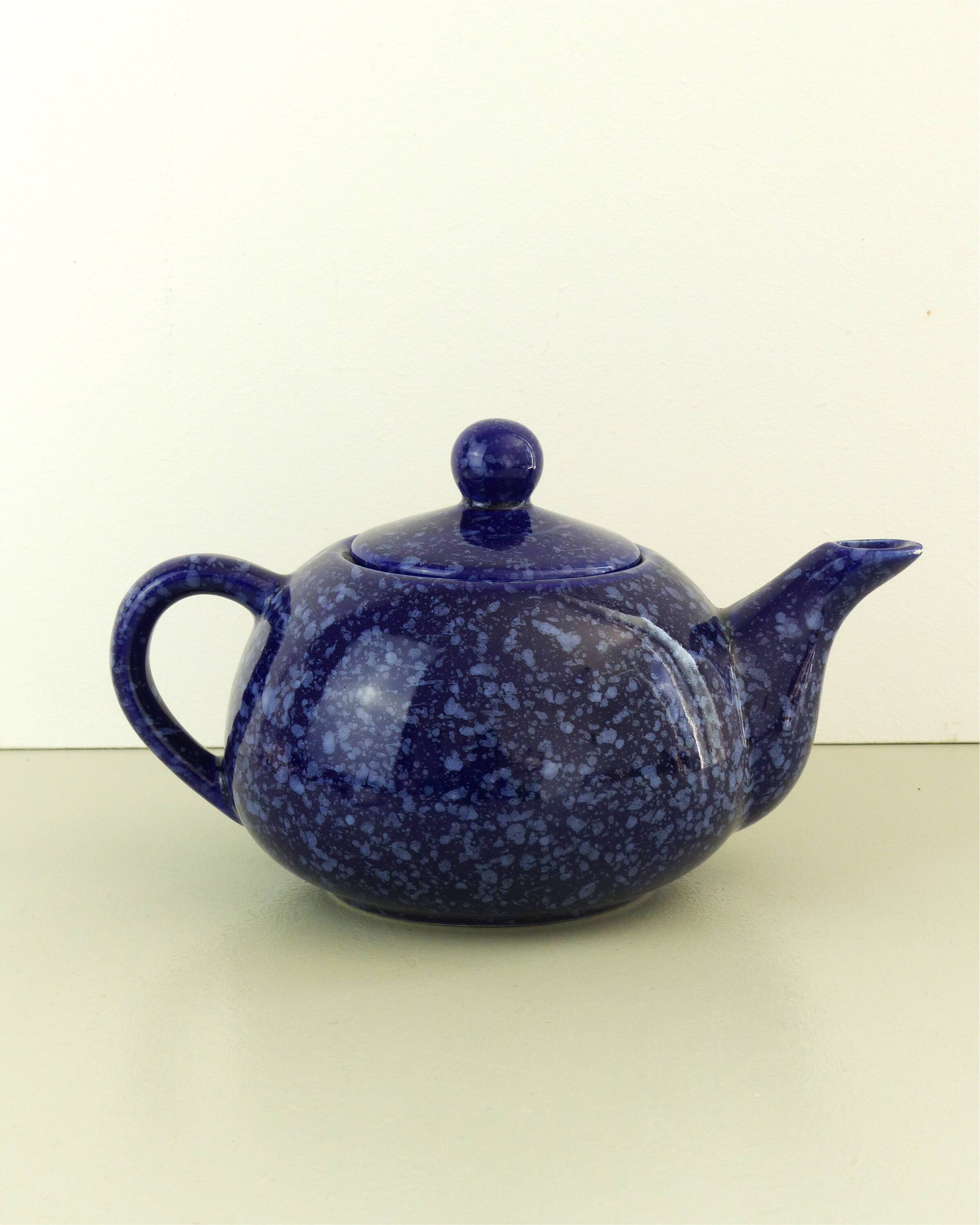 Blue glazed and speckled ceramic teapot