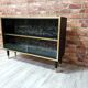 Display case, 1970s Poland, renovated. Black and gold.