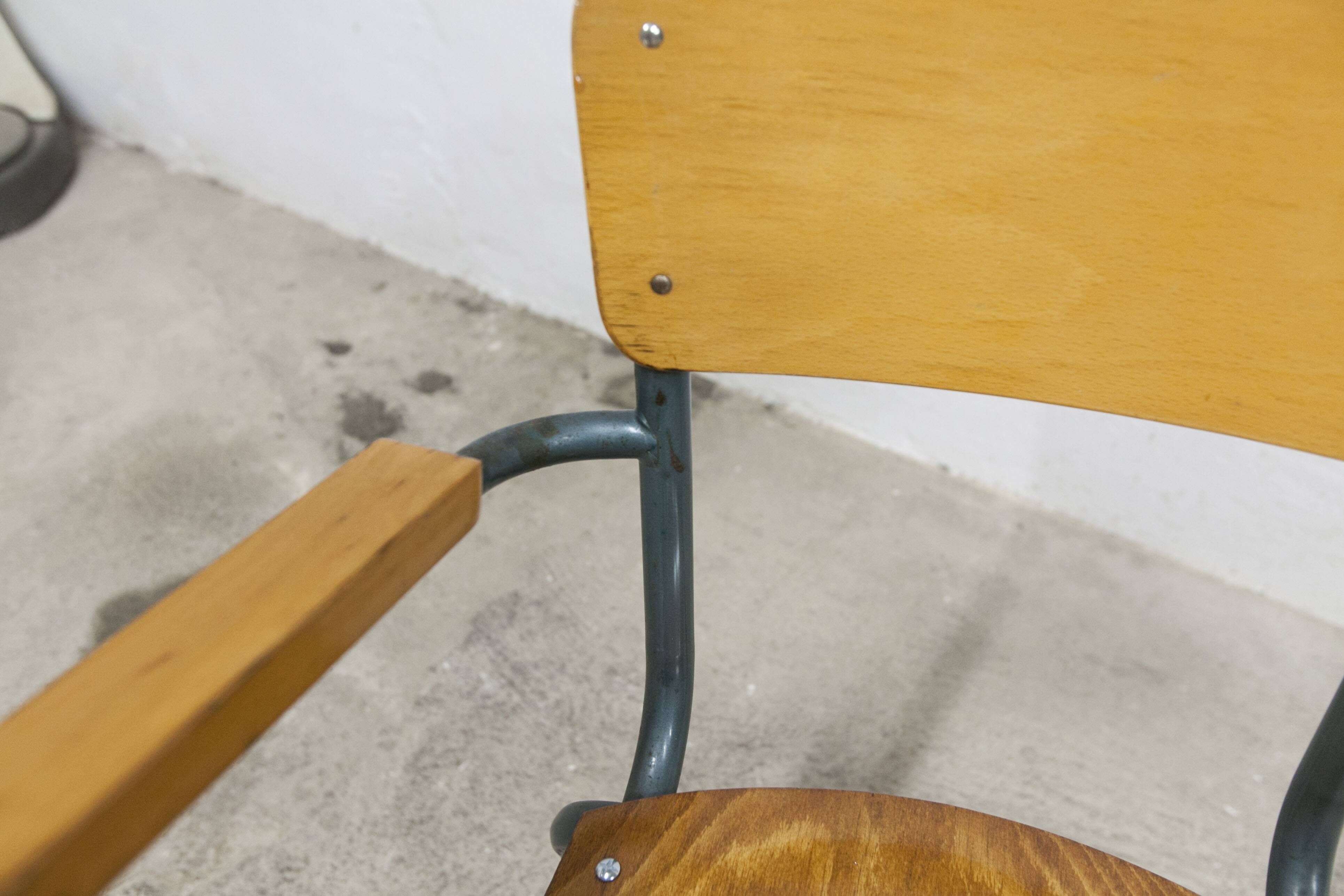 1962 school teacher's chair in honey color and tubular structure