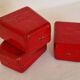 Set of three red painted metal railway boxes with SNCF logo