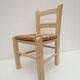 Children's chair of greige color in wood and straw