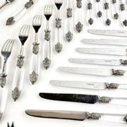 Silver-plated metal cutlery set, plexiglass and stainless steel.