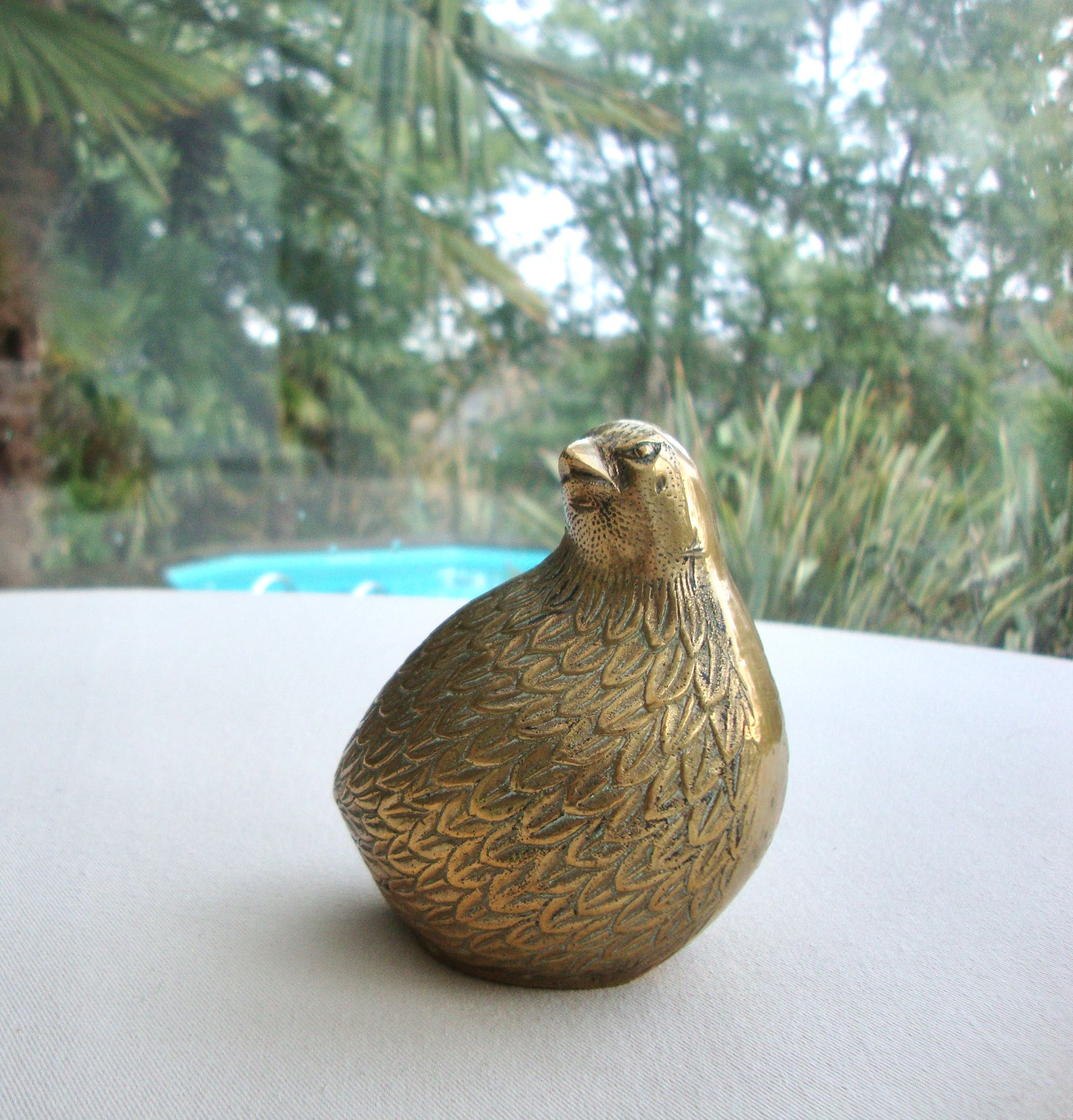 Old brass quail