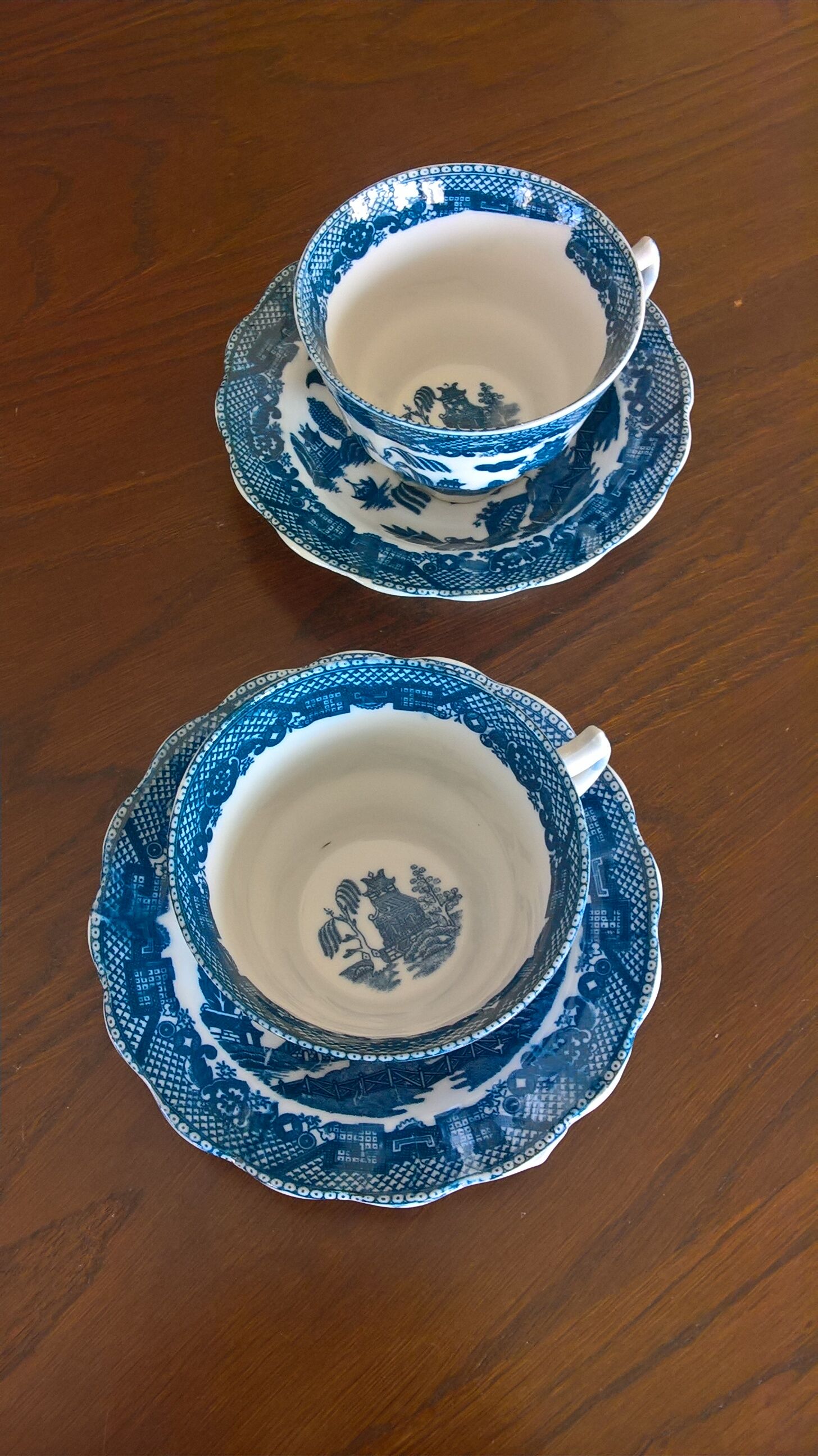 Two Blue Willow porcelain tea cups