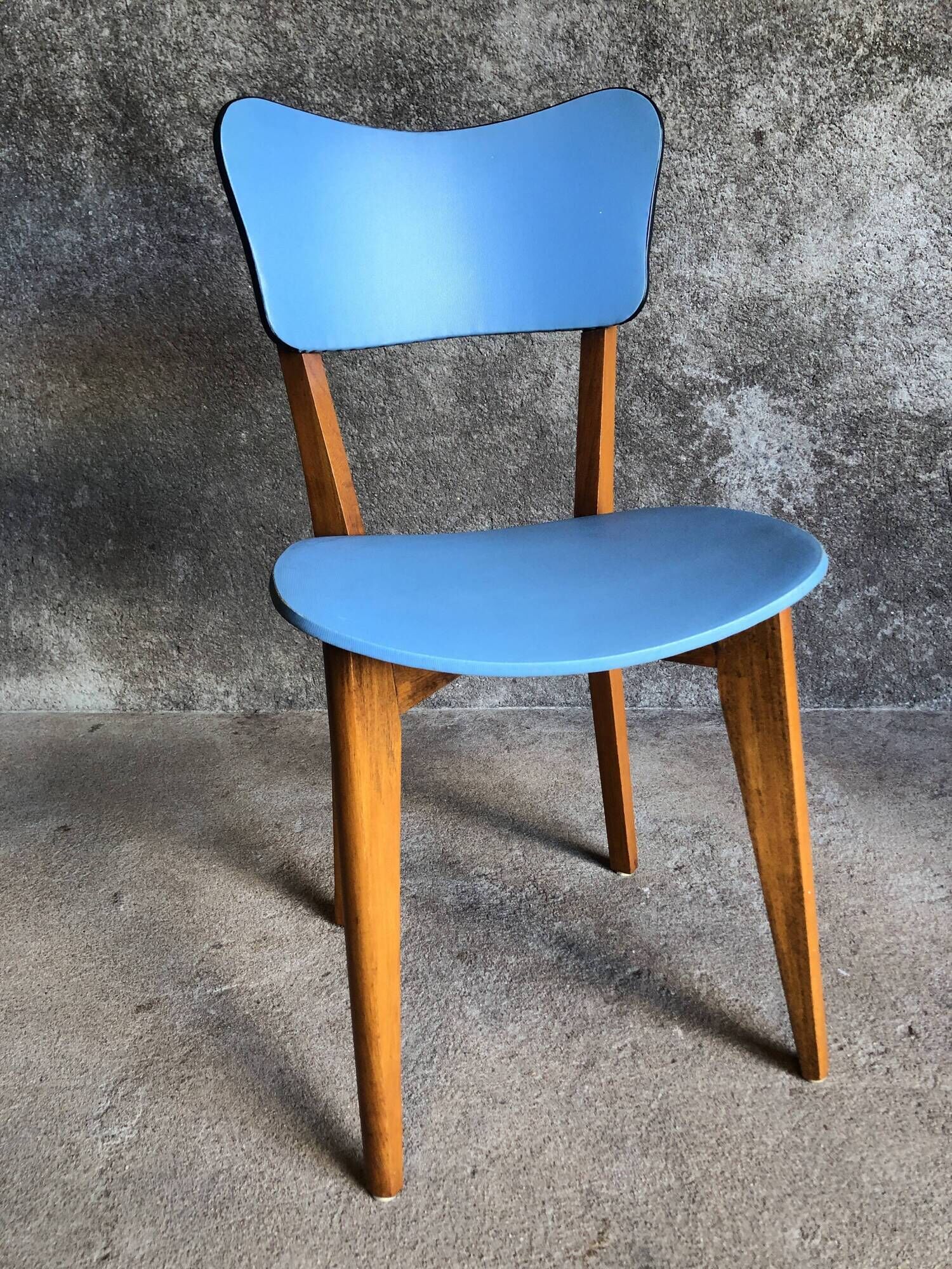 Pair of vintage bistro chairs in wood and light blue vinyl