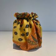 Trompe-l'Œil Ceramic Vase in the Shape of a Knotted Bag with Floral Decoration. Work