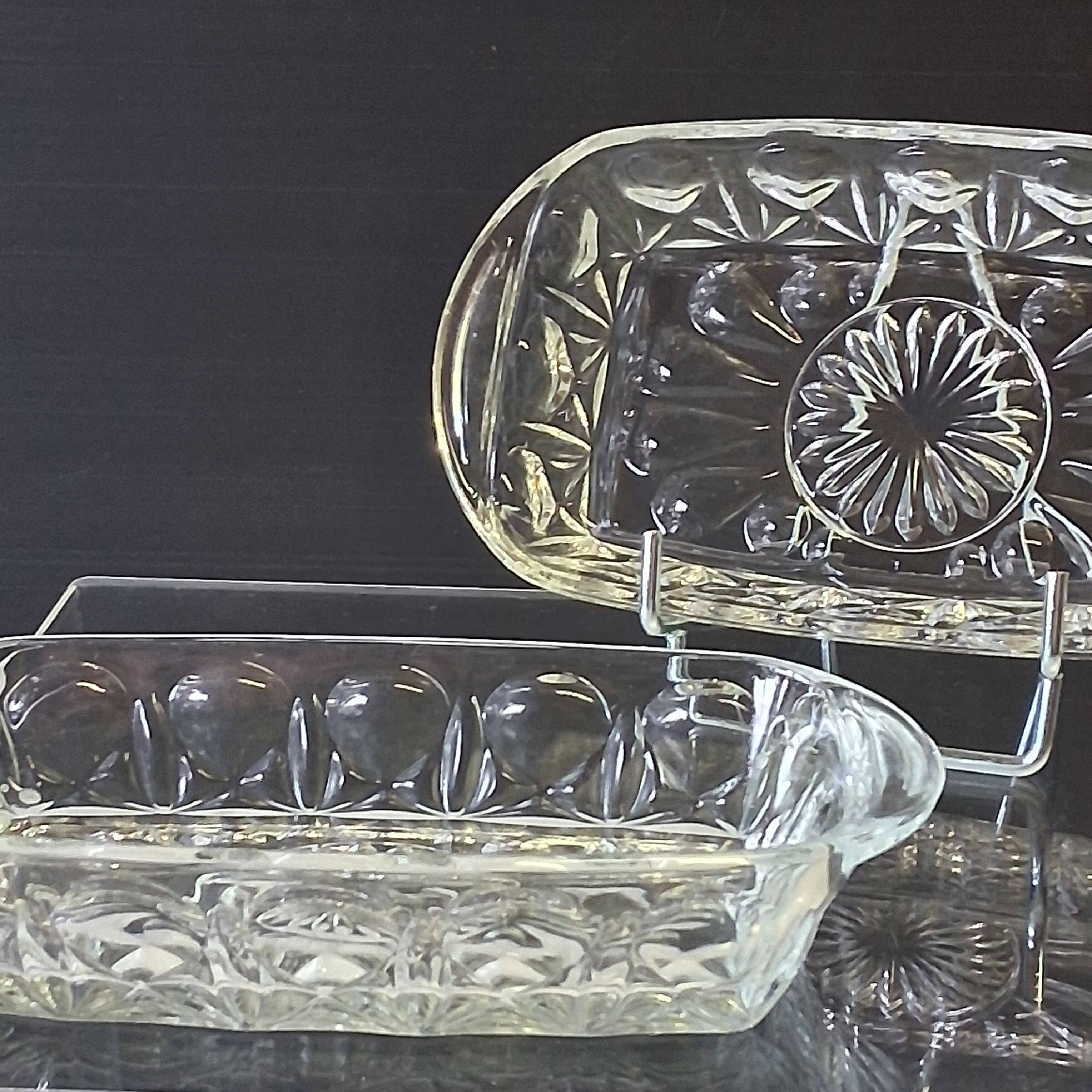 2 transparent glass ramekins with handles in very good condition.