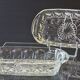 2 transparent glass ramekins with handles in very good condition.