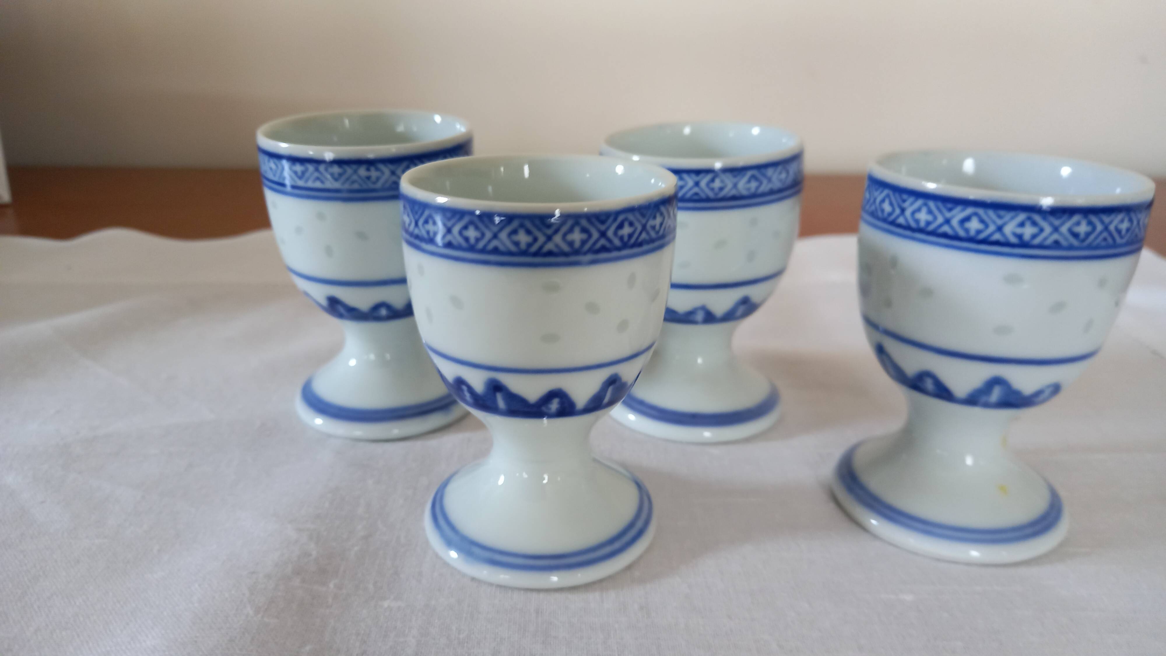 Set of 4 blue and white egg cups