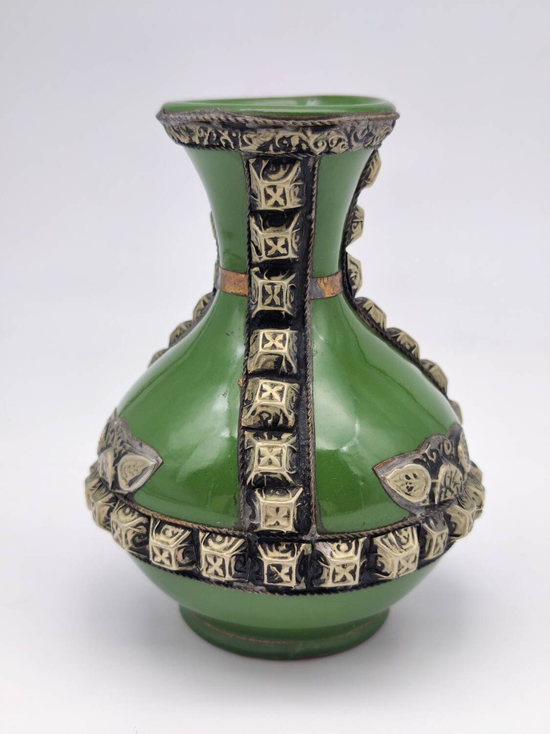 Antique green glazed ceramic vase with relief decoration – Europe