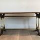 Neoclassical coffee table in wood, brass and leather