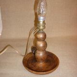Turned wooden lamp base.