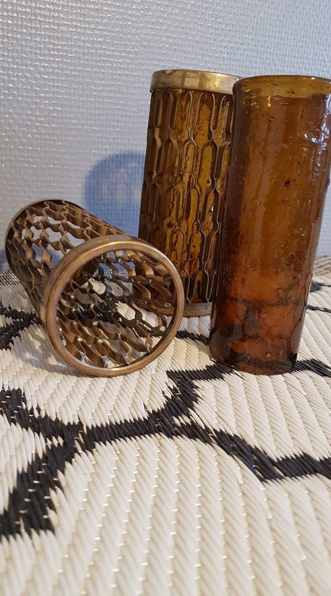 Photophores moucharabieh style candlesticks in brass and orange bubbled glass