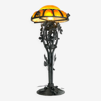 Wrought iron lamp with glass paste dome circled