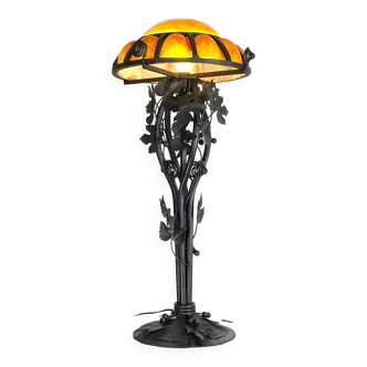 Wrought iron lamp with glass paste dome circled