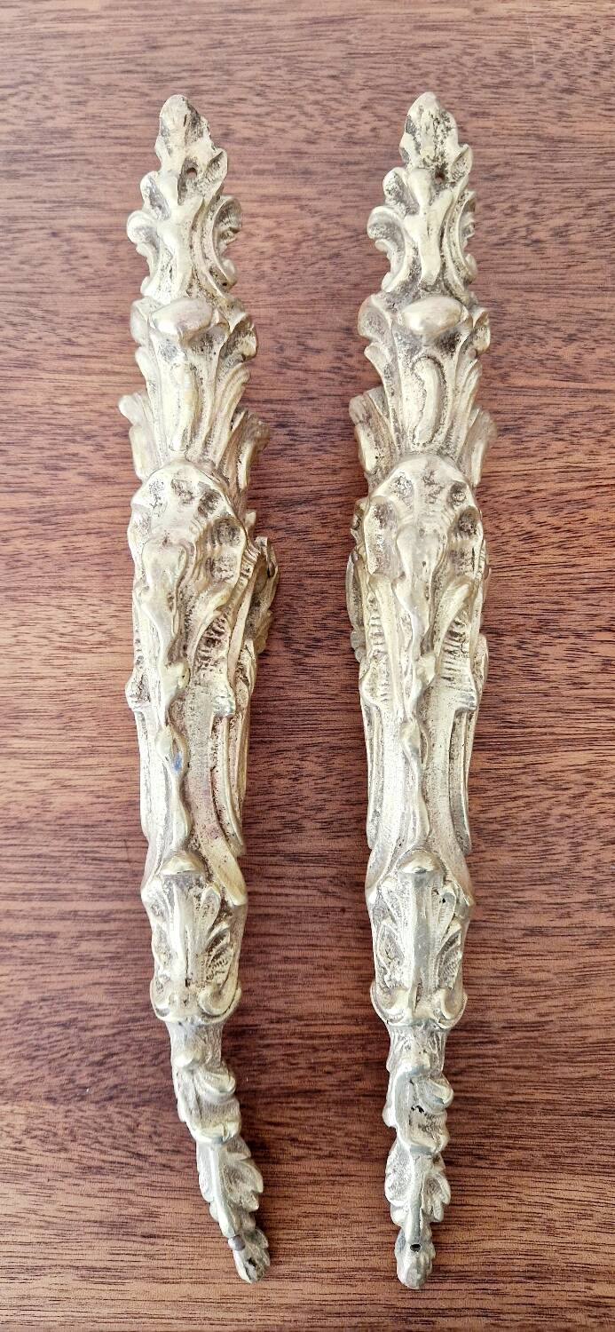 Antique bronze ornaments and pediment