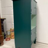 Two-door green bedside table