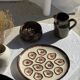Large circular platter with compartments for shellfish, molluscs, and oysters.