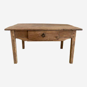Old farmhouse coffee table in raw wood