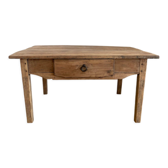 Old farmhouse coffee table in raw wood