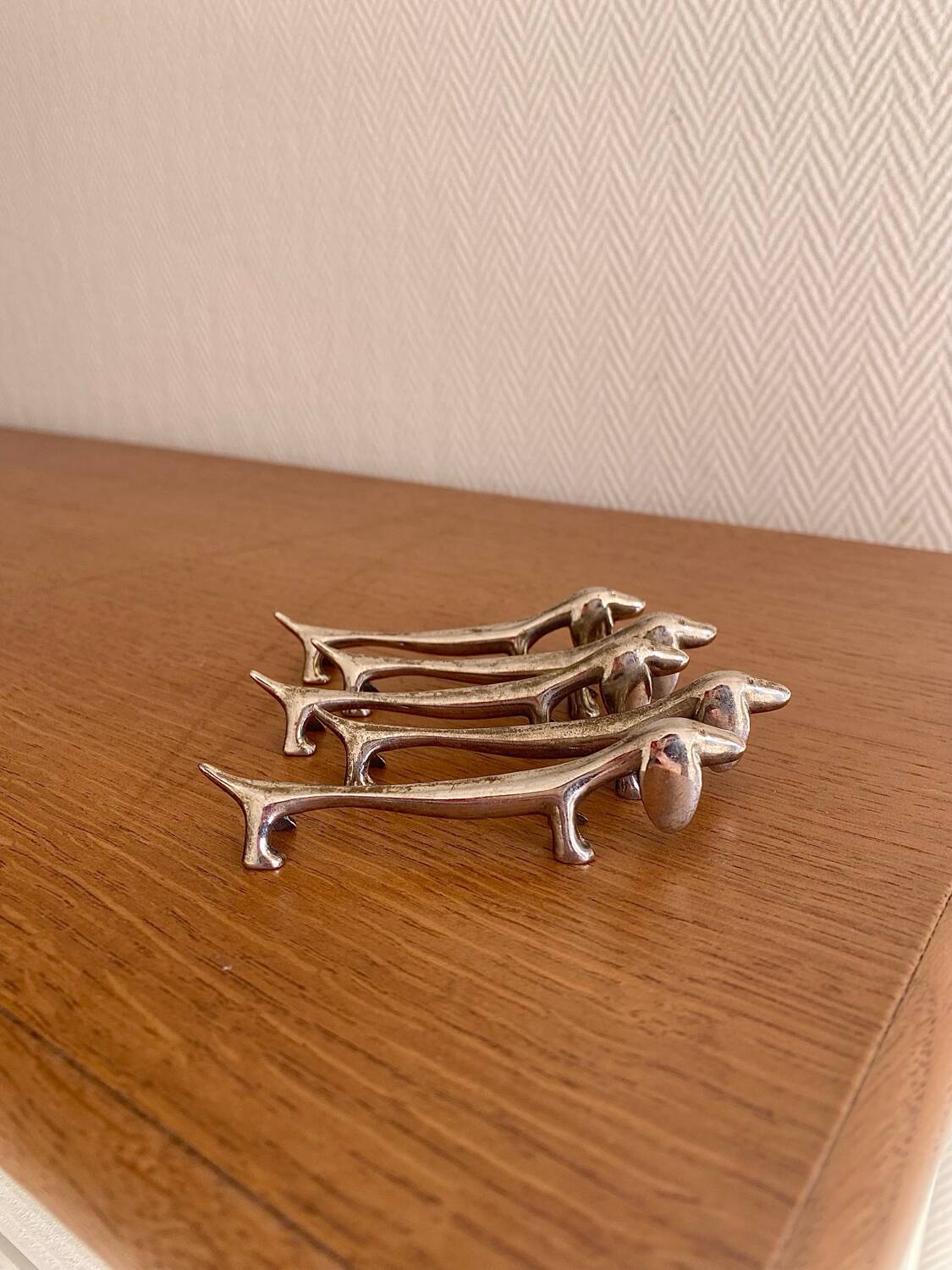 Vintage silver-plated dog knife rests