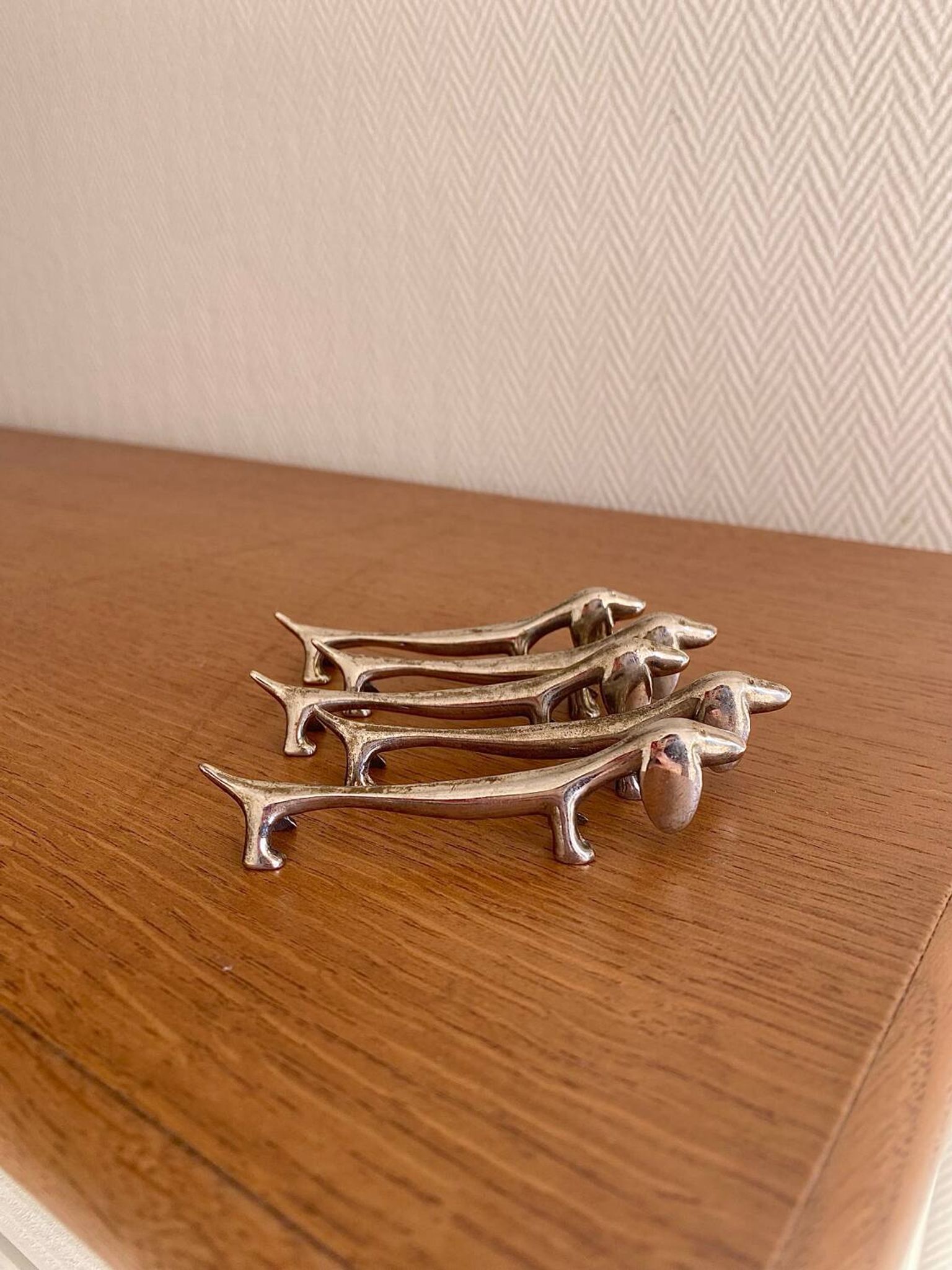 Vintage silver-plated dog knife rests