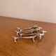Vintage silver-plated dog knife rests
