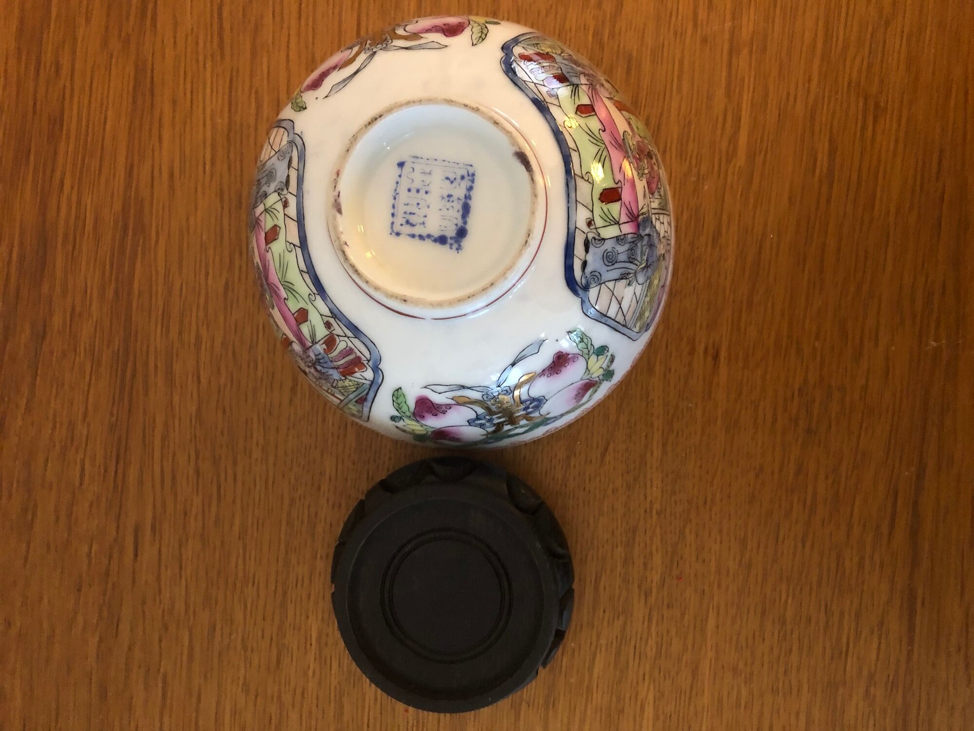 Chinese porcelain bowl on wooden base