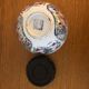 Chinese porcelain bowl on wooden base