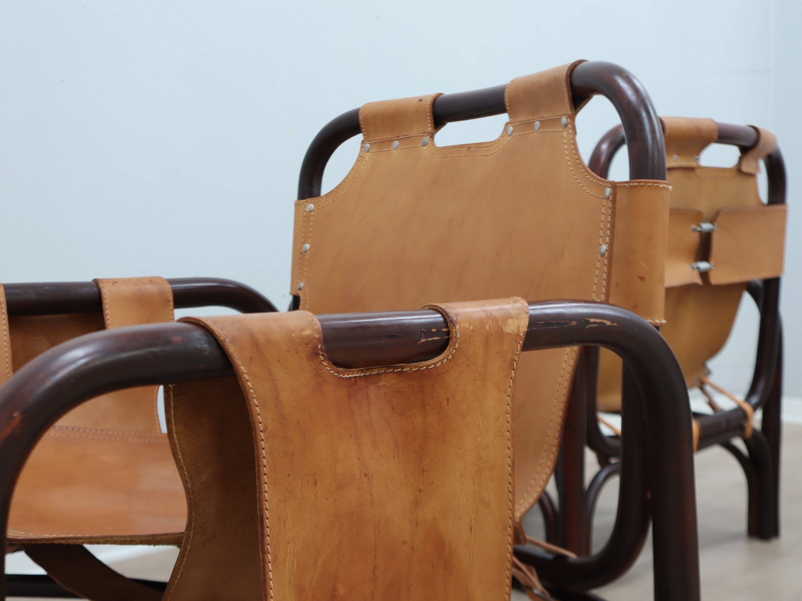 A vintage Tito Agnoli armchair leather and bamboo 1960s