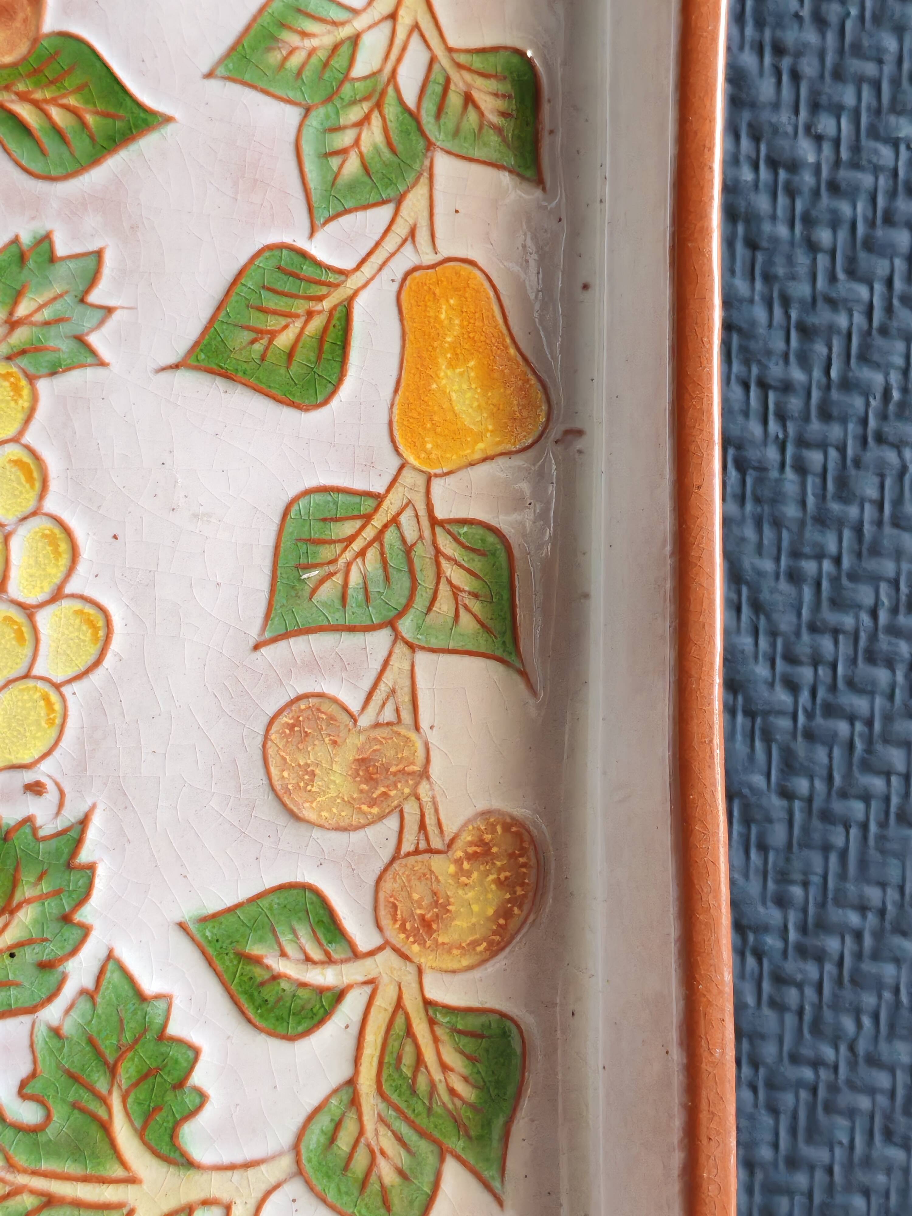 Terracotta plate signed P.Boy, glazed artisanal ceramics.