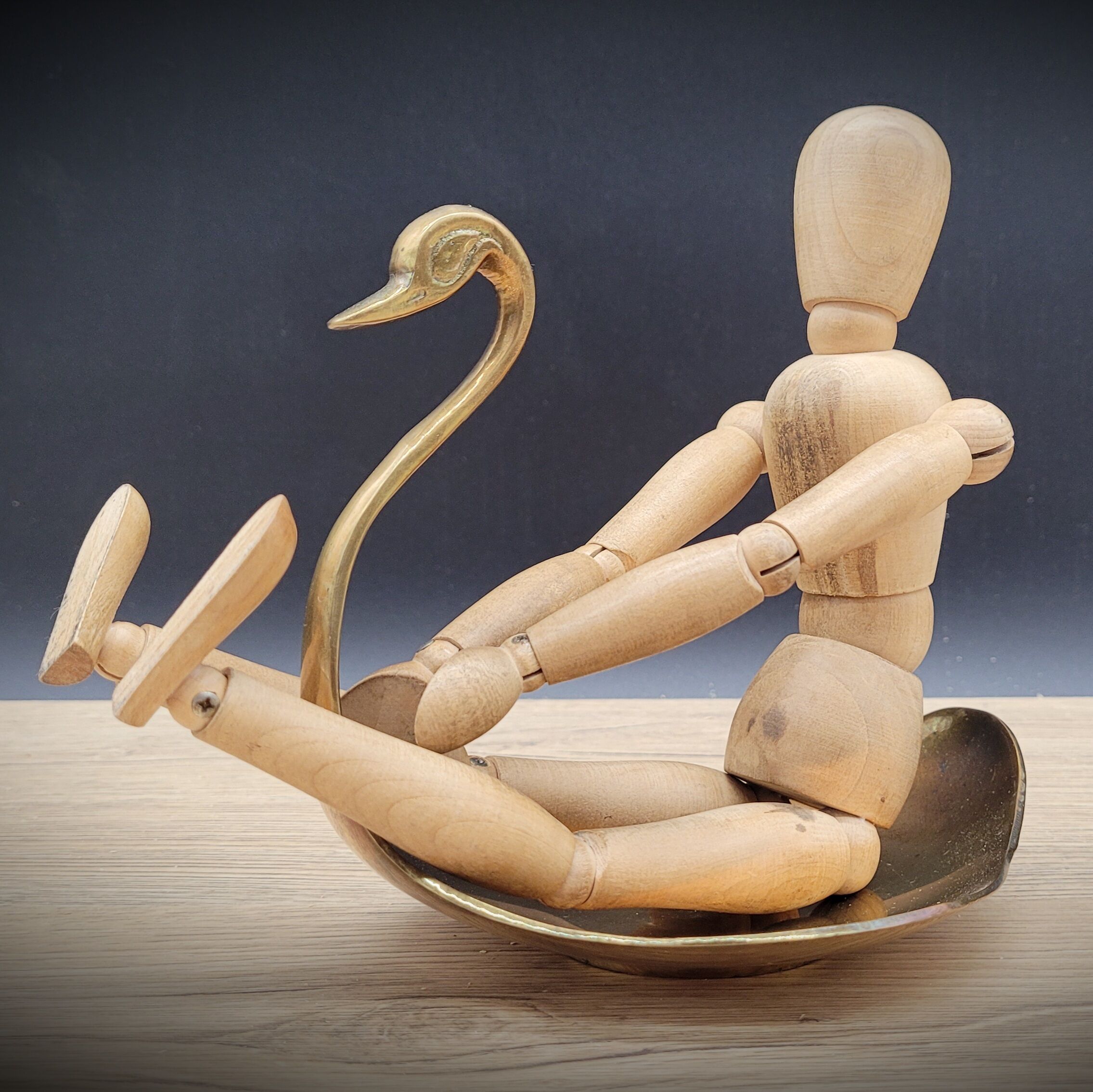 Empty swan brass pocket