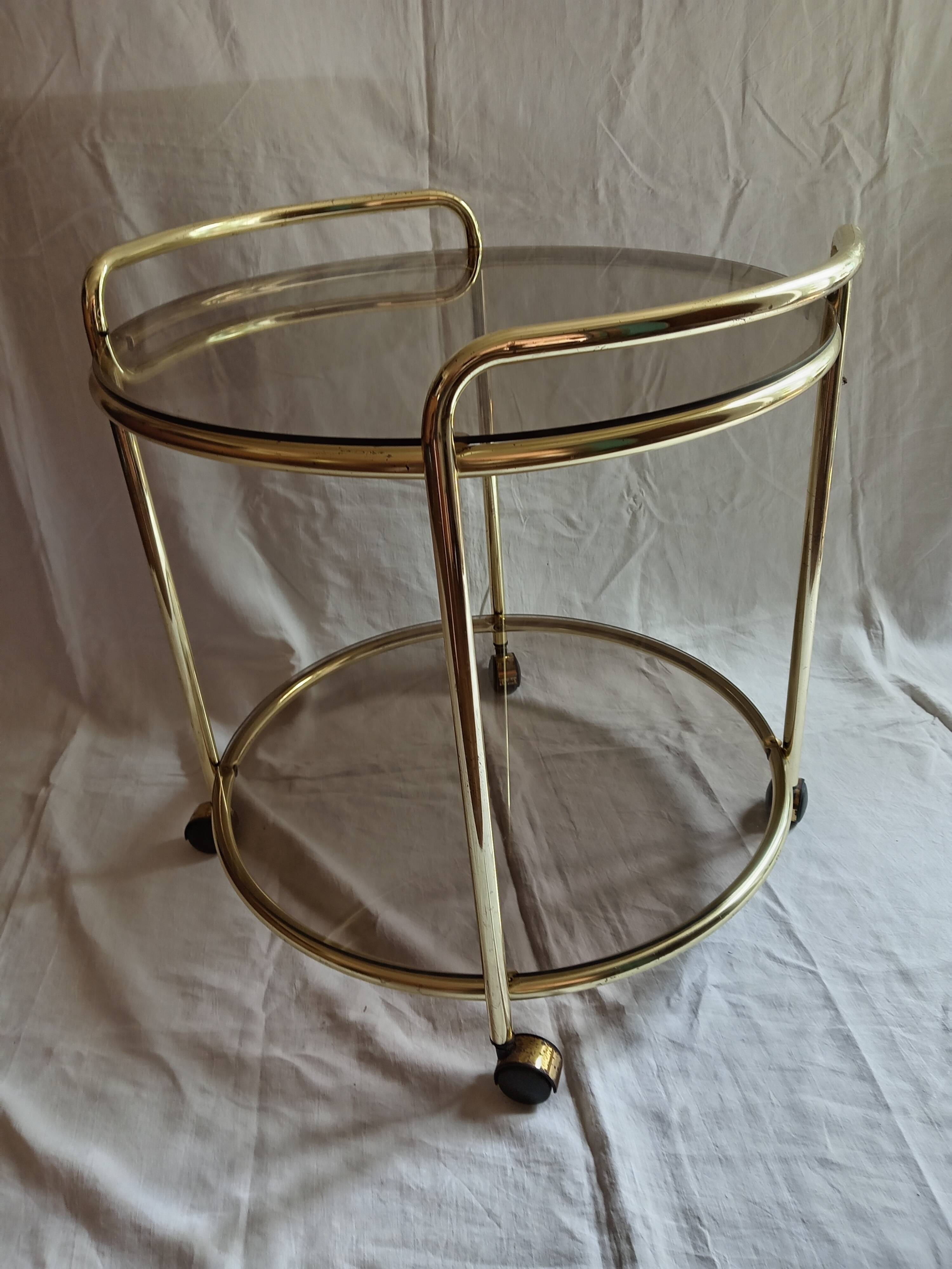 Vintage serving trolley with smoked glass from the 1970s