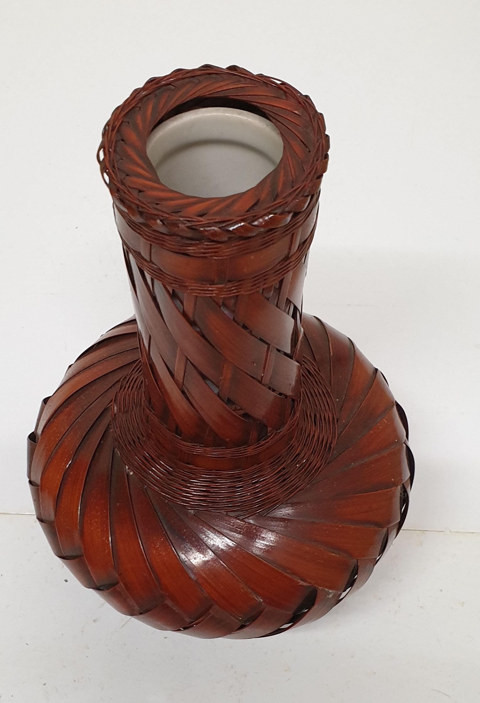 Vase made of braided bamboo leaves