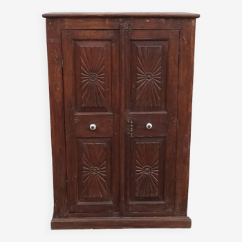 Old wooden cabinet with ceramic handles