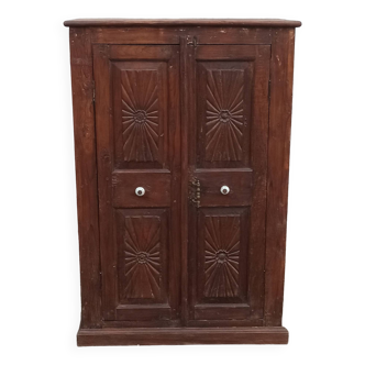 Old wooden cabinet with ceramic handles