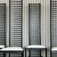 Set of 4 Postmodern Steel Dining Chairs – Sculptural High-Back Design, c. 1980s